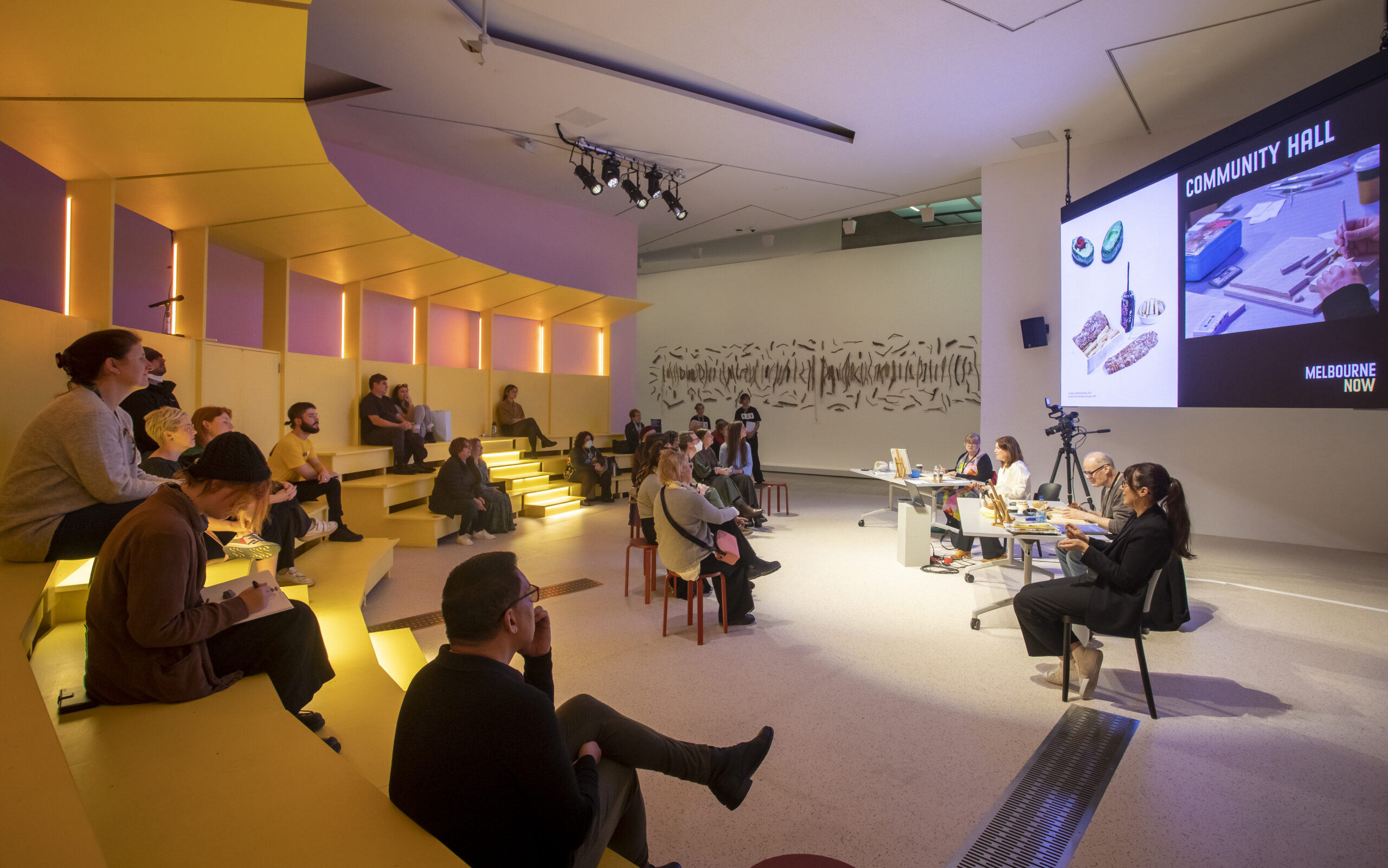 Audience watching the APA Artist Talks at Melbourne Now's Community Hall