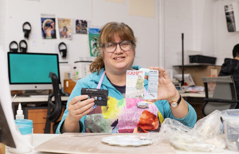 Lisa Reid making ceramic sculptures in Arts Project Australia's studio