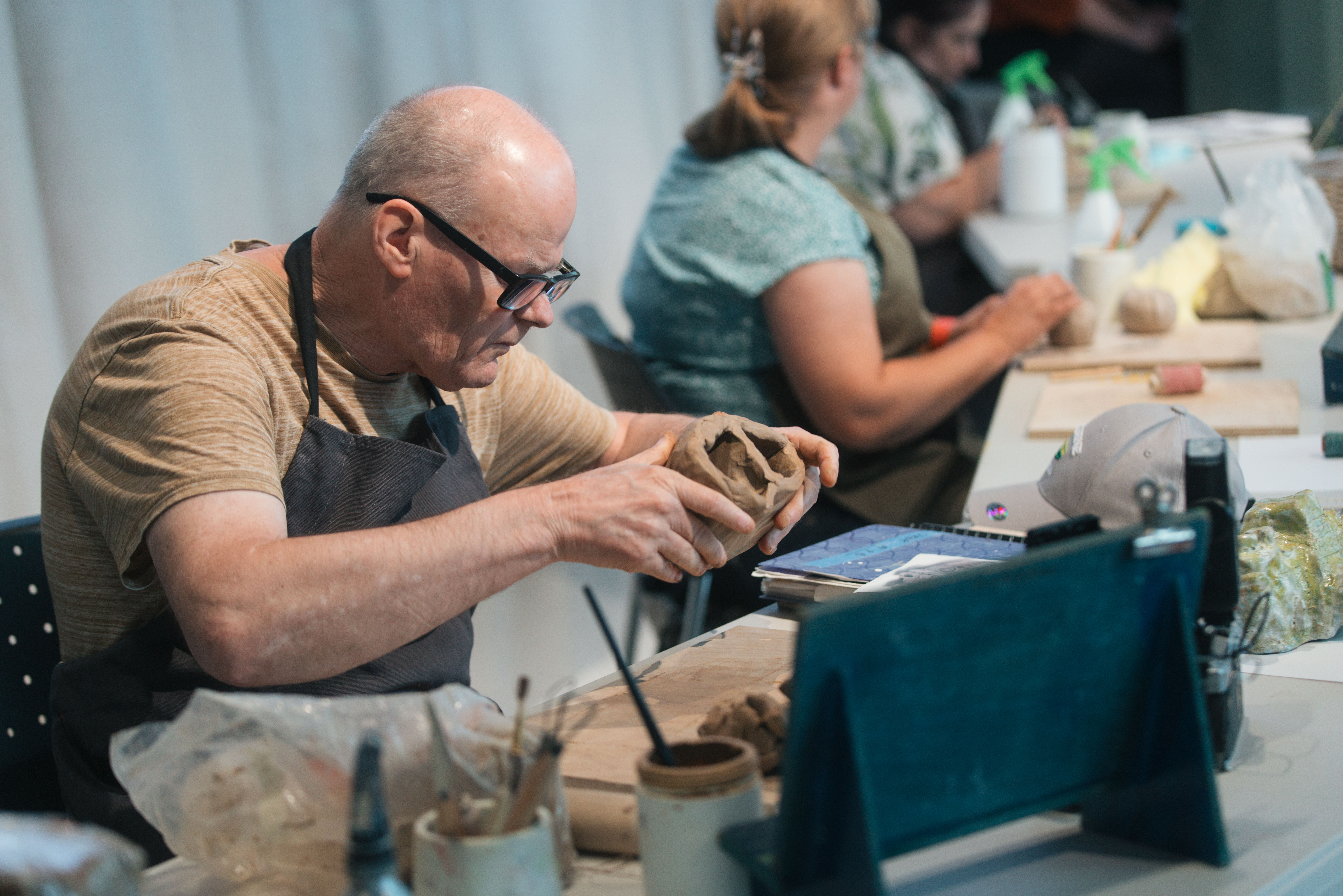 Alan Constable working the clay during the ceramics demonstration