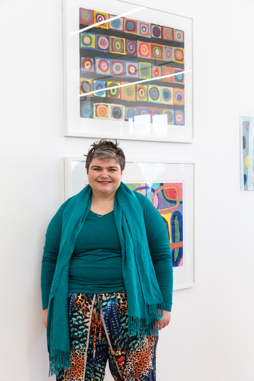 Monica Lazzari standing in the APA gallery