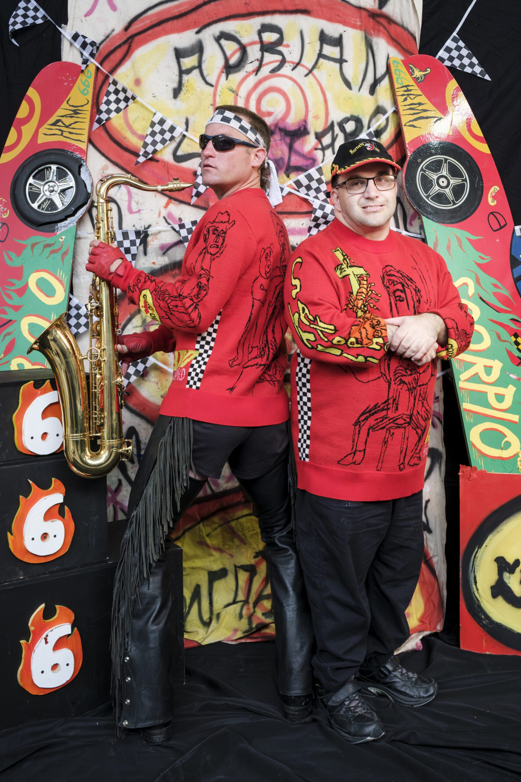 Cong Josie and Adrian Lazzaro modelling their collaborative Wah Wah jumper.