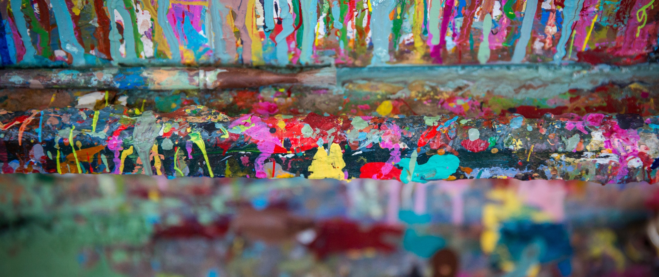 this is a photo of paint splashes on an eisel.