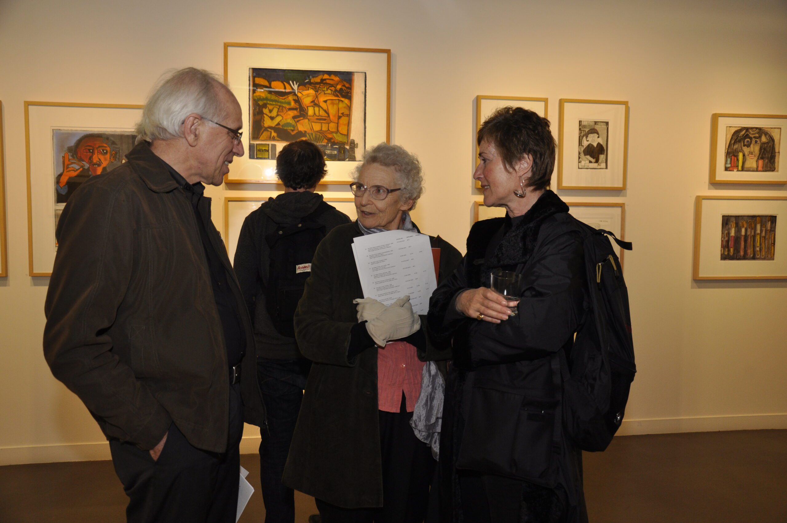 Kitty Ginter (centre) at the APA exhibition opening of 'Peripheral Observer' in 2012.